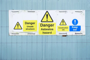Asbestos warning signs on building